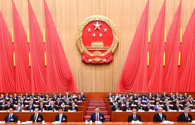 十四届全国人大四次会议在京开幕 习近平等在主席台就座